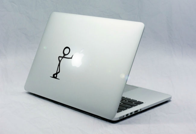 Sticker Macbook Bonhomme appuyé Contre Pomme